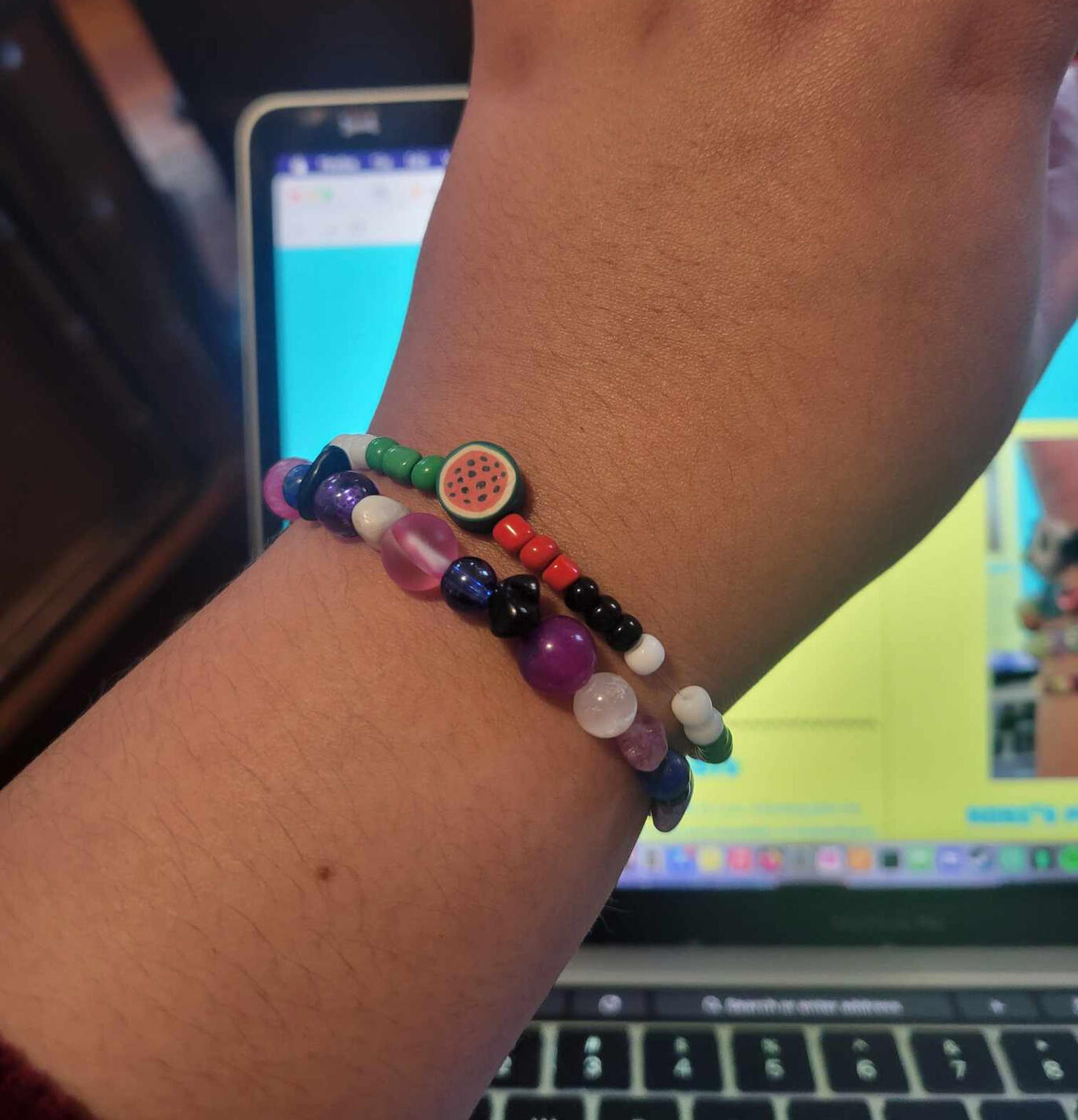 A picture of the 4 bracelets that robi wears every day.