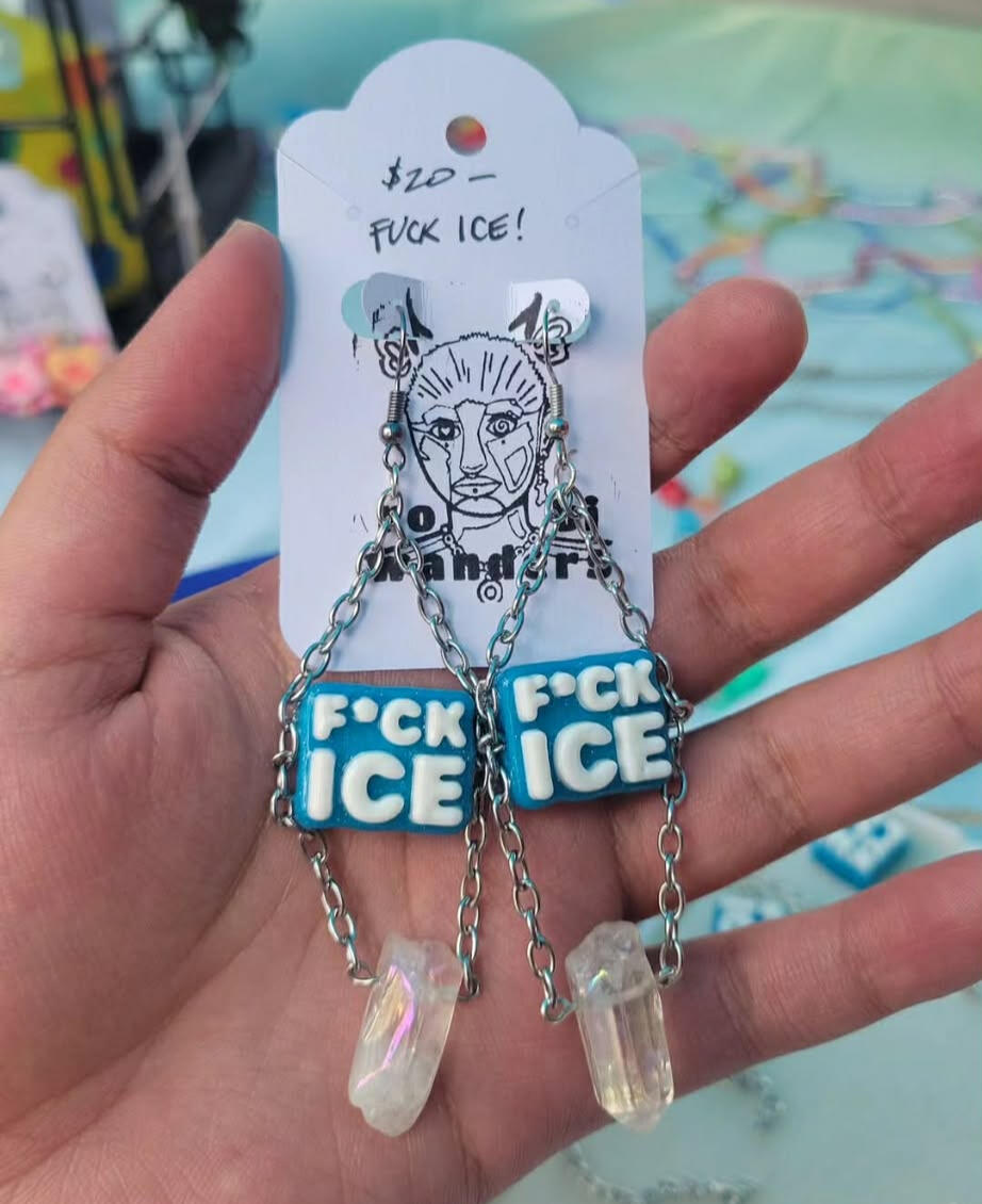 a table spread with robiwanders bracelets and chokers